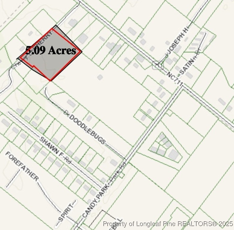 Cherry Lane Pembroke, NC 28372 - Photo 2 of 2 a sign on a wall next to a white wall