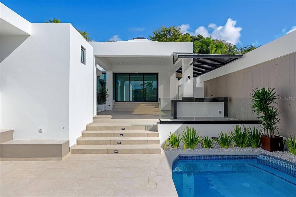 373 Guaynabo Prairie Guaynabo, PR 00969 - Photo 16 of 17 a view of a house with a patio