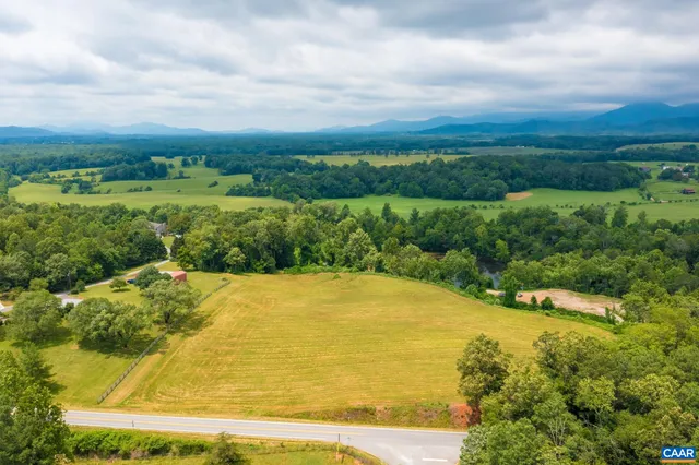 a view of a yard with an outdoor space and seating area