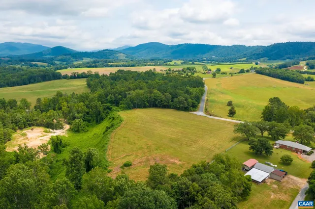 a view of a lake with a yard