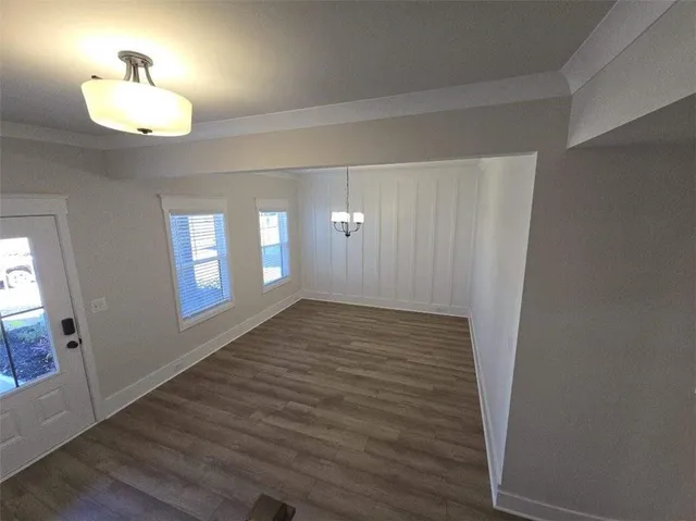 a view of an empty room and window