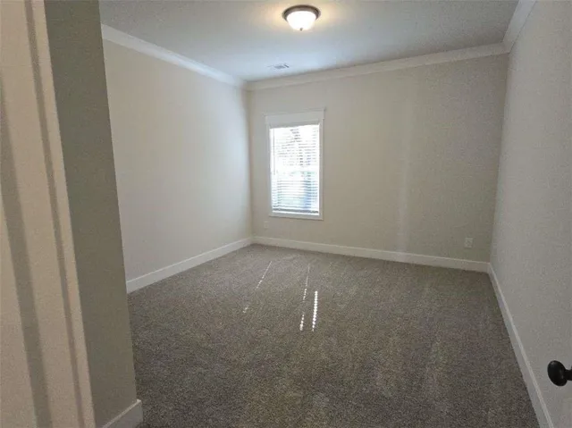a view of a room that has a window in it