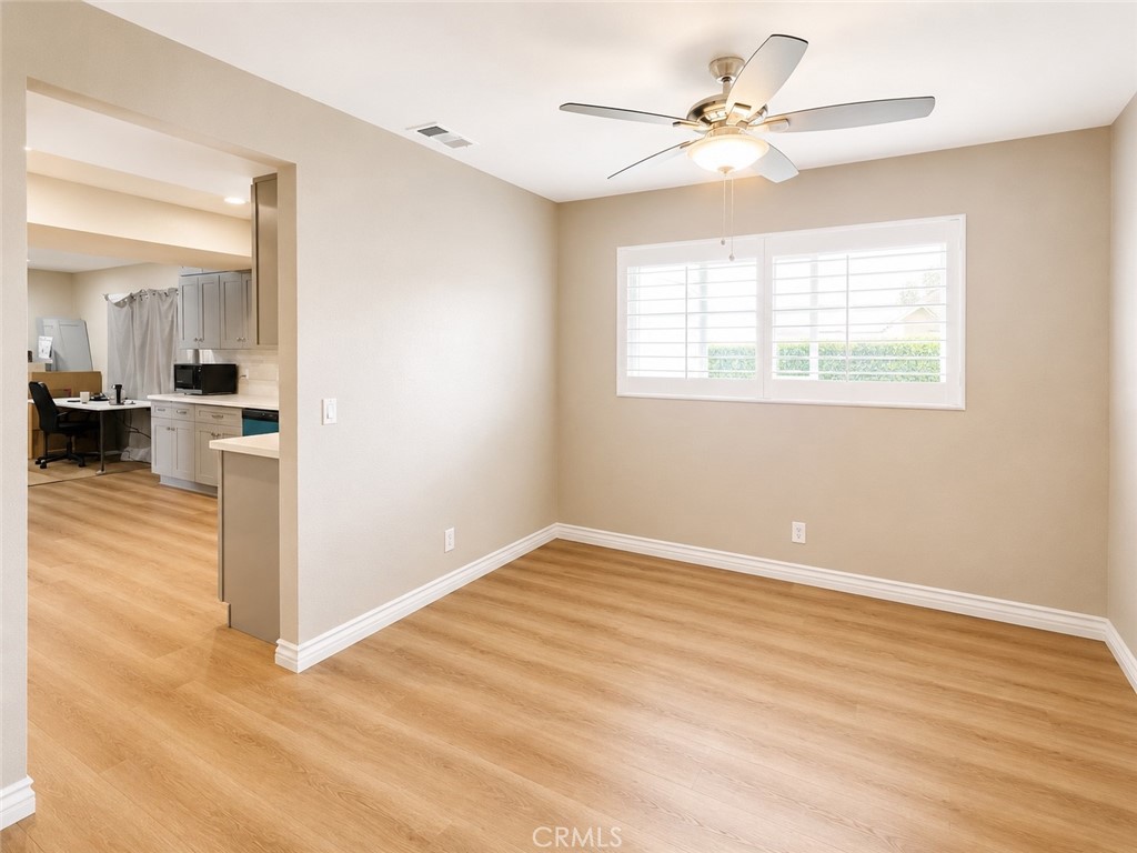 1118 West Orange Road Santa Ana, CA 92706 - Photo 4 of 18 wooden floor in an empty room with a window
