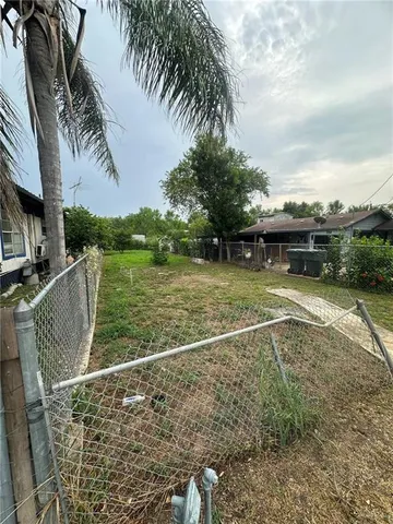 a view of a swimming pool with a garden