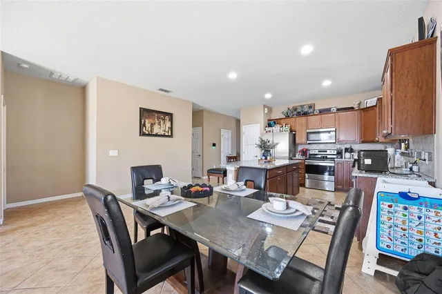 a view of a dining room with furniture