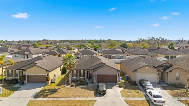 a view of a city with a building in the background