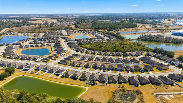 a view of a city with an ocean