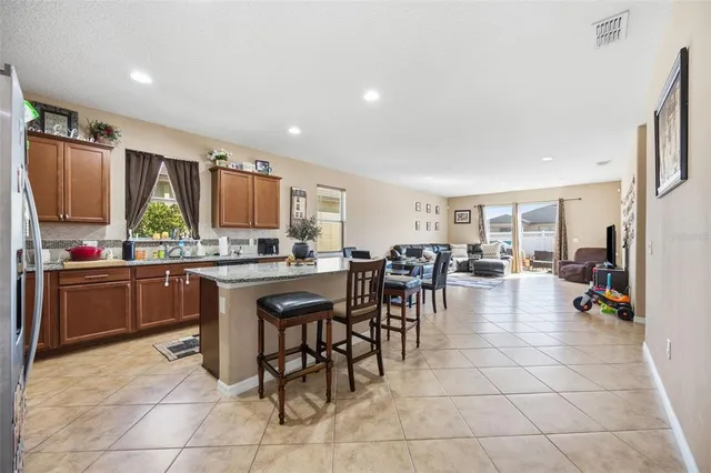 a kitchen with counter top space and appliances