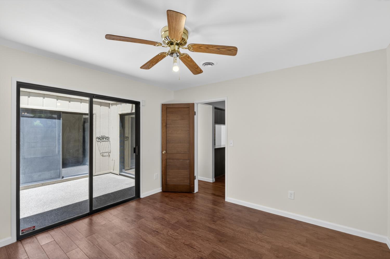 1338 Hunn Road, Unit 26 Yuba City, CA 95993 - Photo 33 of 58 Second Bedroom with Sliding Glass Door to Private Atrium