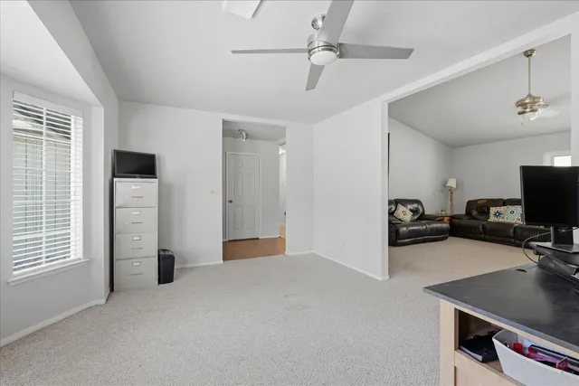 a view of a livingroom with a flat screen tv