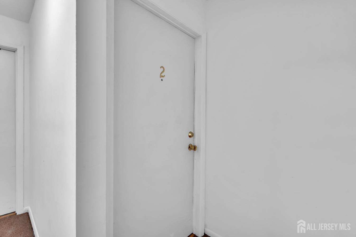 1595 East 2nd Street, Unit 2 Scotch Plains, NJ 07076 - Photo 12 of 13 a close up view of shower