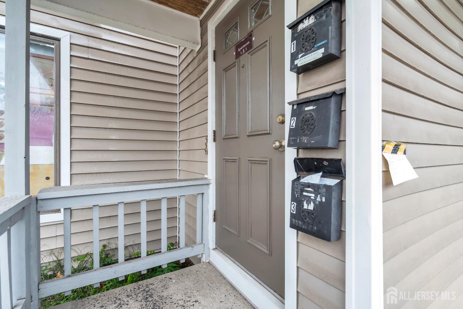 1595 East 2nd Street, Unit 2 Scotch Plains, NJ 07076 - Photo 13 of 13 a view of a house with a door and a window