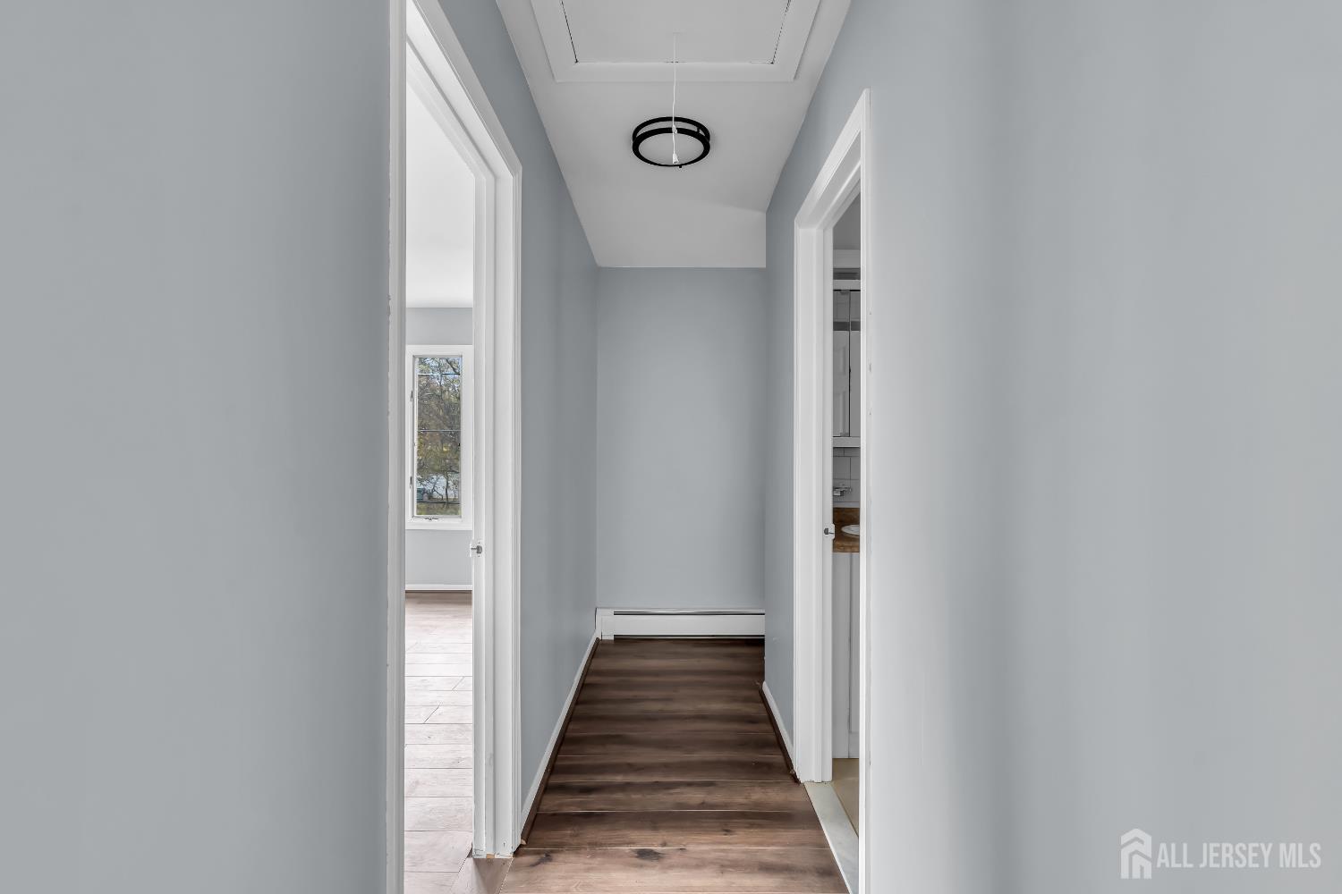 1595 East 2nd Street, Unit 2 Scotch Plains, NJ 07076 - Photo 9 of 13 a view of a entryway door with stairs