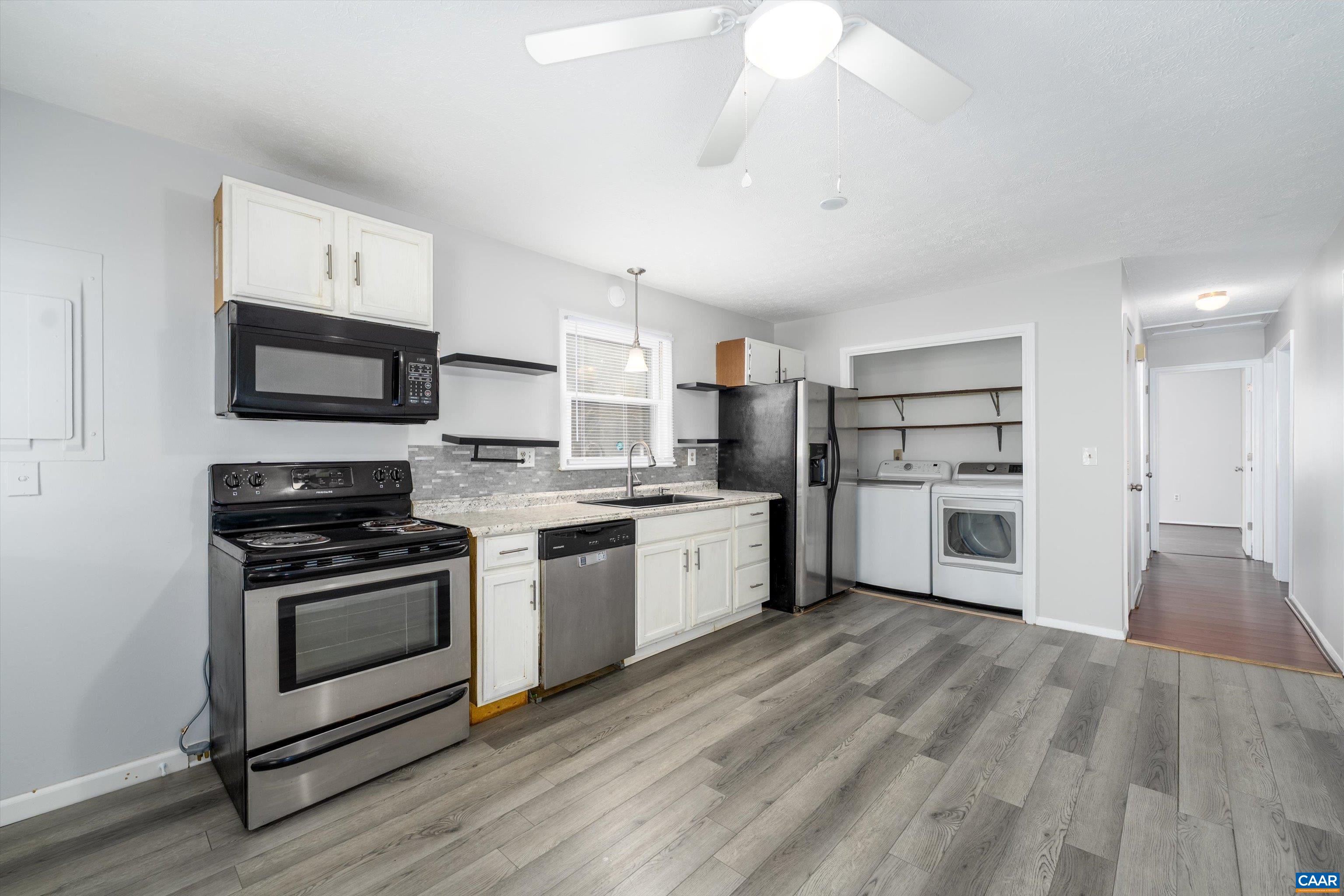 9 Pleasant View Terrace Palmyra, VA 22963 - Photo 13 of 34 a kitchen with stainless steel appliances a stove a refrigerator and a microwave