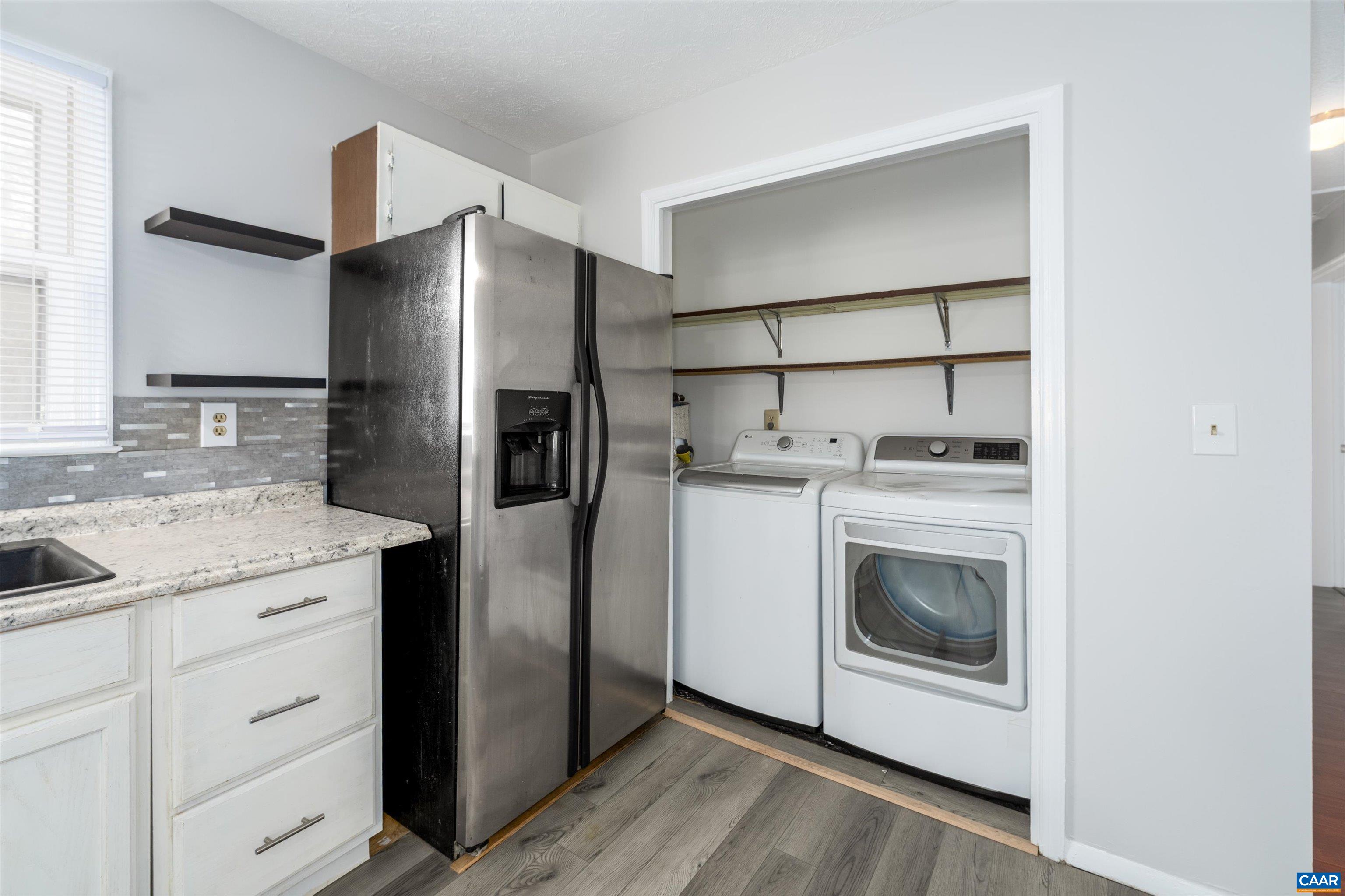 9 Pleasant View Terrace Palmyra, VA 22963 - Photo 17 of 34 a kitchen with a refrigerator sink and cabinets