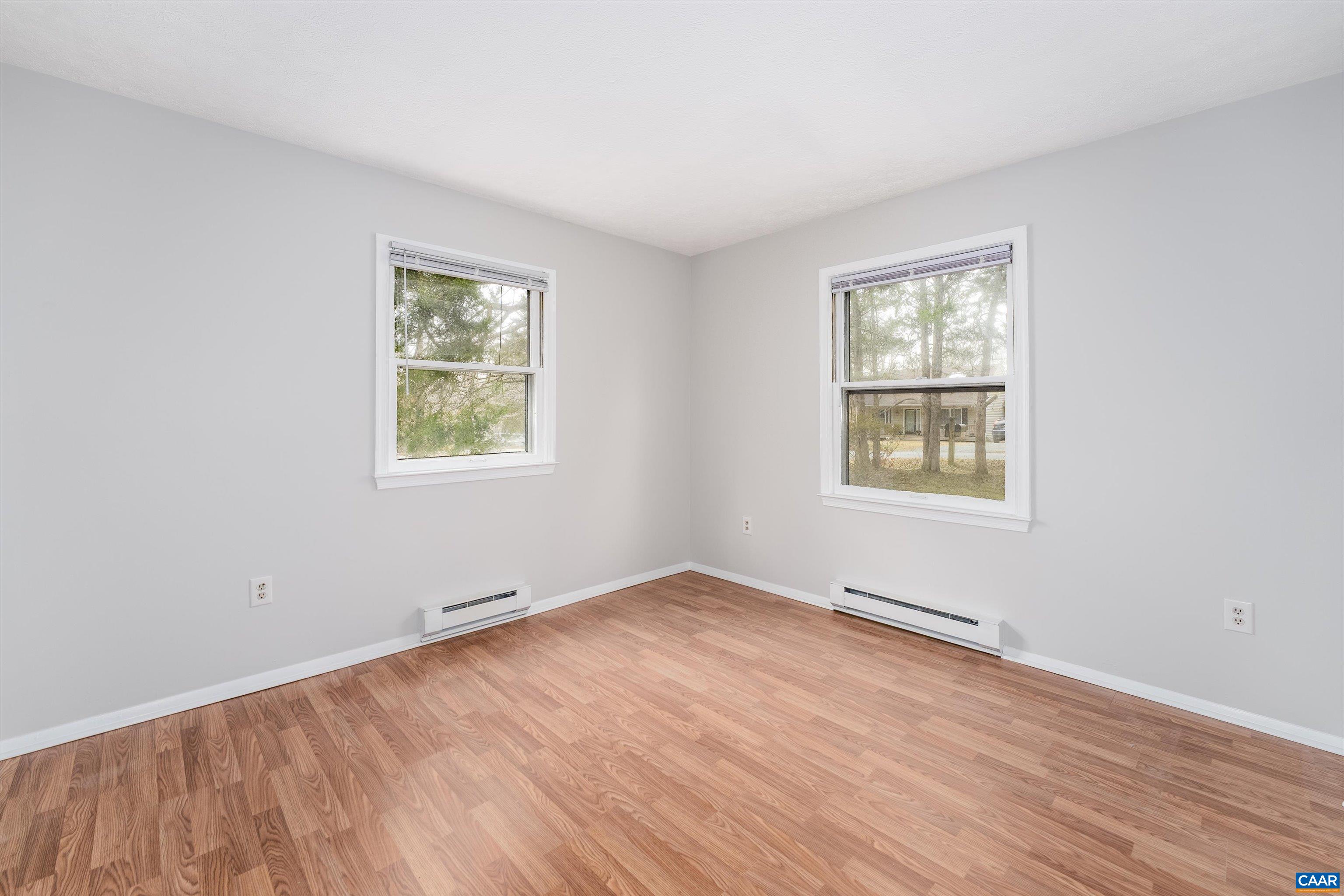 9 Pleasant View Terrace Palmyra, VA 22963 - Photo 19 of 34 an empty room with wooden floor and windows