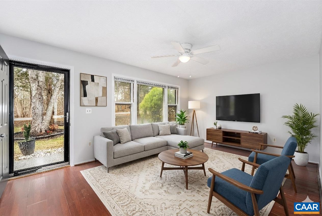 9 Pleasant View Terrace Palmyra, VA 22963 - Photo 2 of 34 a living room with furniture and a flat screen tv