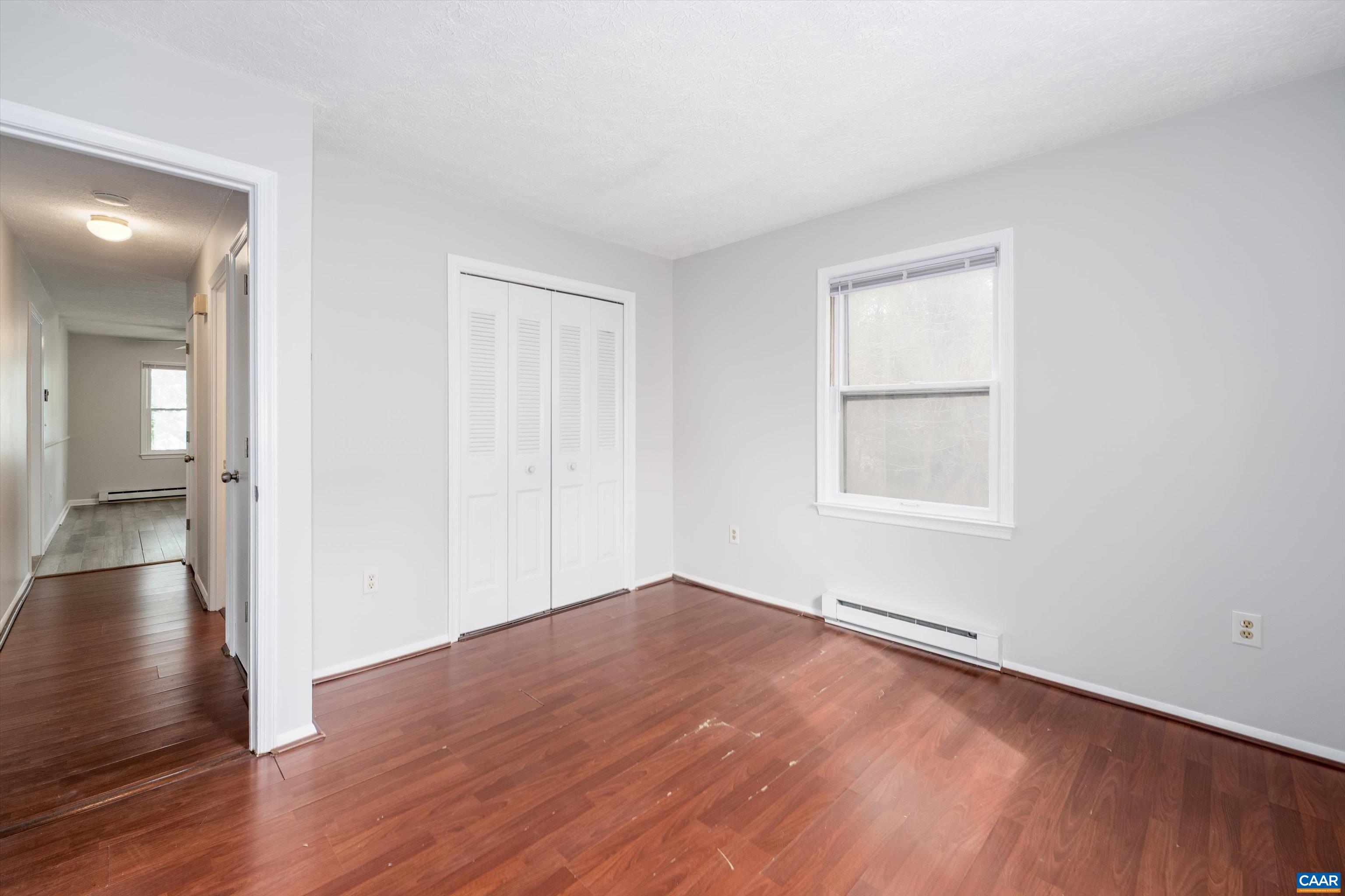 9 Pleasant View Terrace Palmyra, VA 22963 - Photo 23 of 34 an empty room with wooden floor and windows