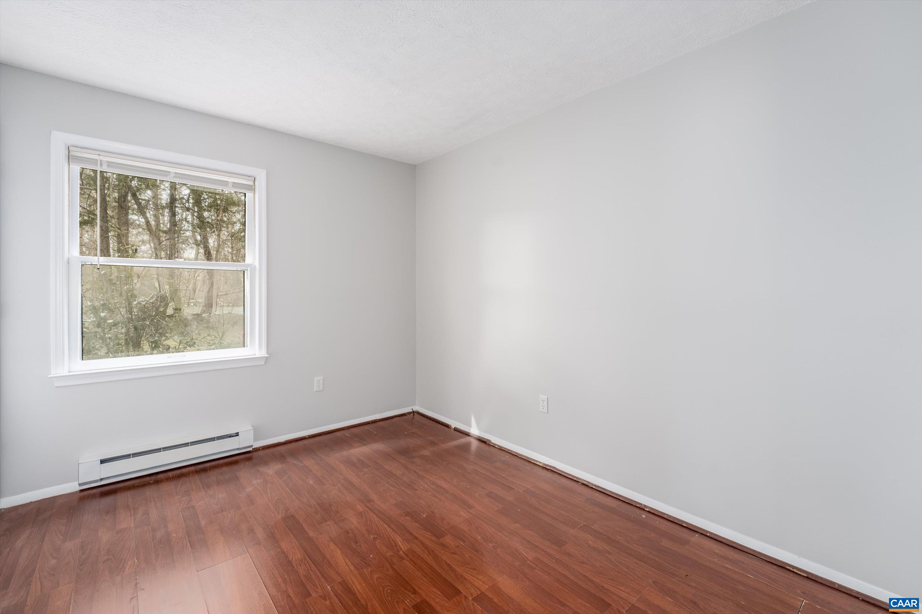 9 Pleasant View Terrace Palmyra, VA 22963 - Photo 24 of 34 an empty room with wooden floor and windows