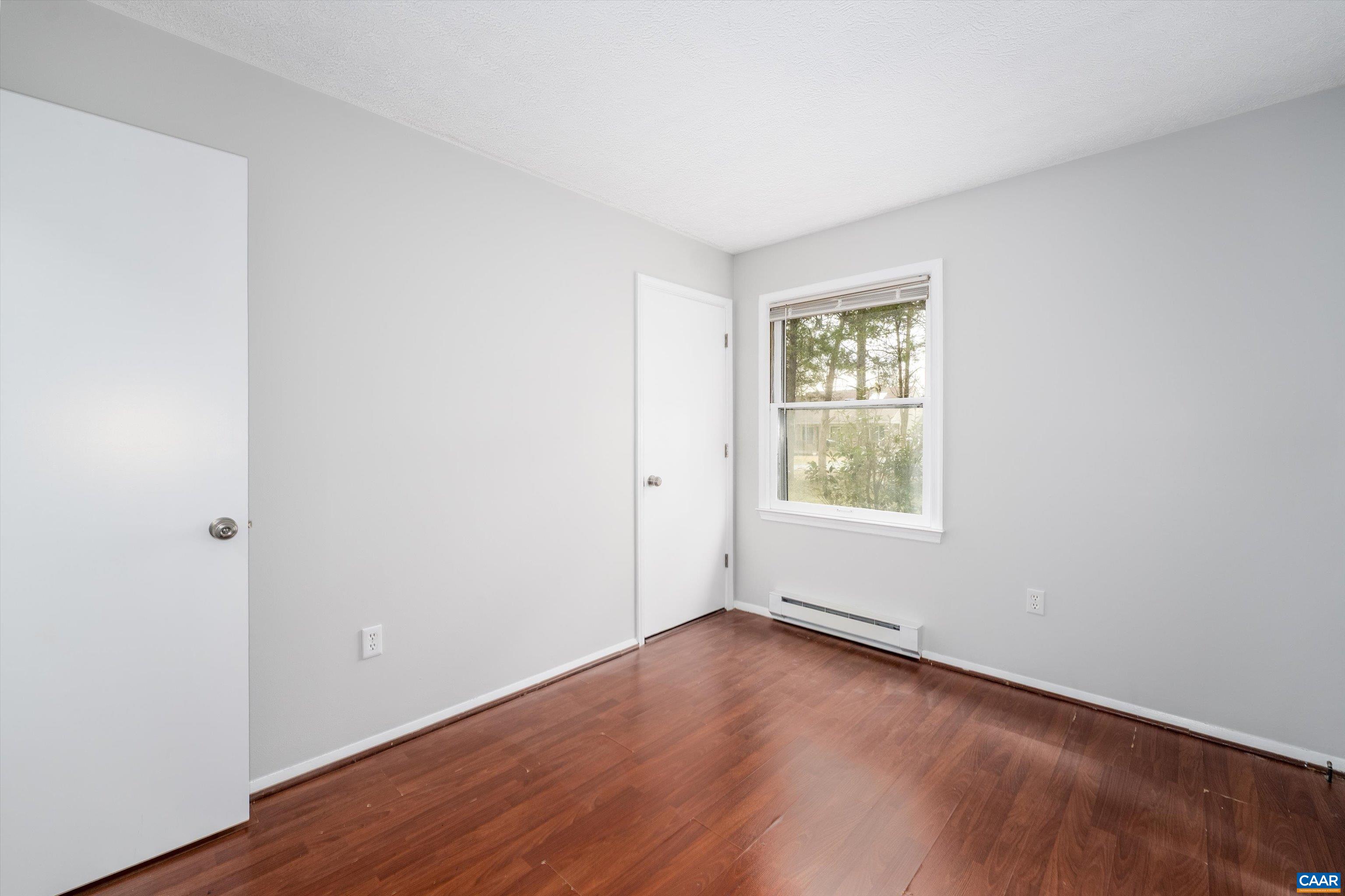 9 Pleasant View Terrace Palmyra, VA 22963 - Photo 25 of 34 an empty room with wooden floor and windows