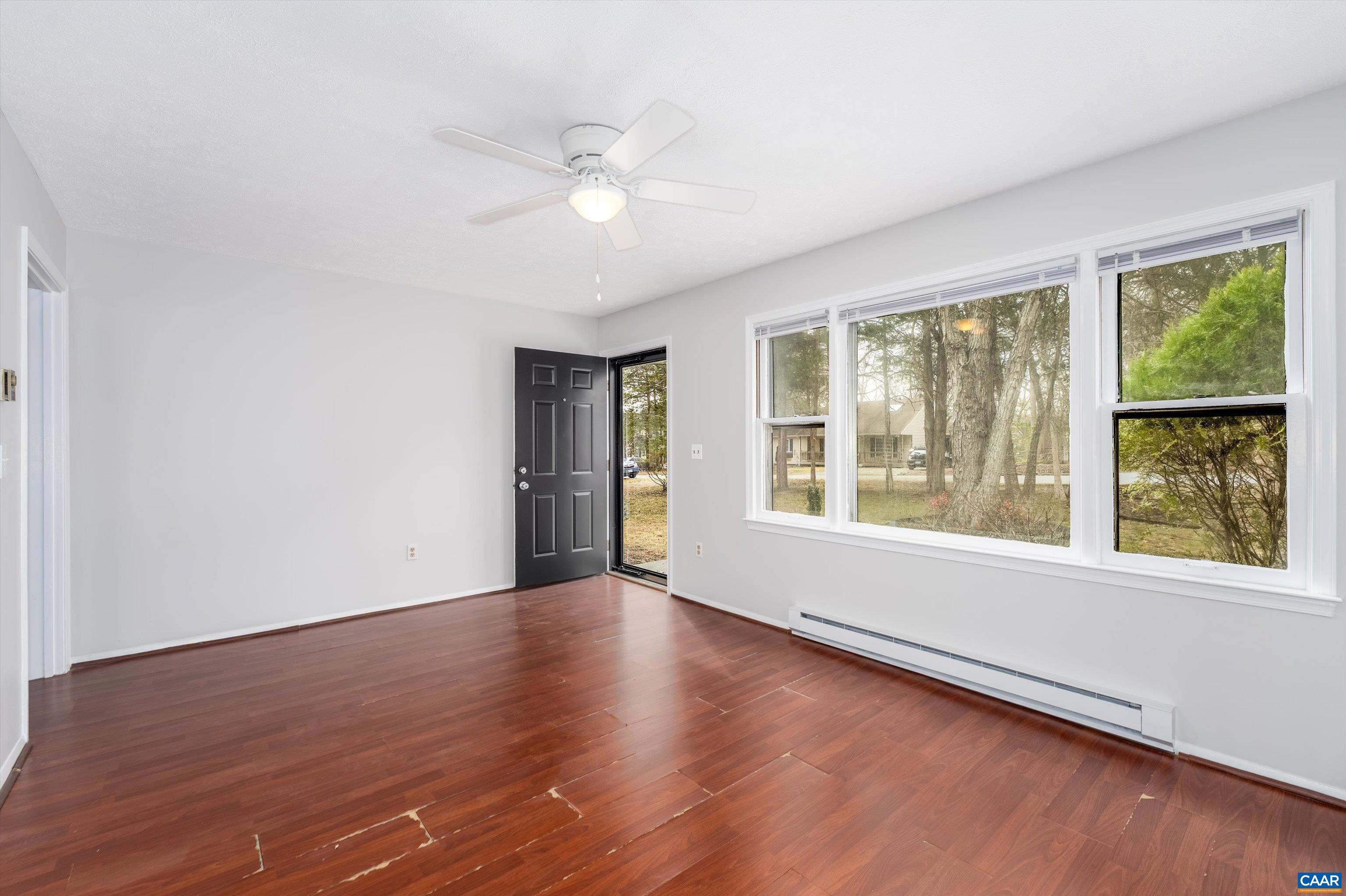 9 Pleasant View Terrace Palmyra, VA 22963 - Photo 10 of 34 a view of an empty room with wooden floor and a window