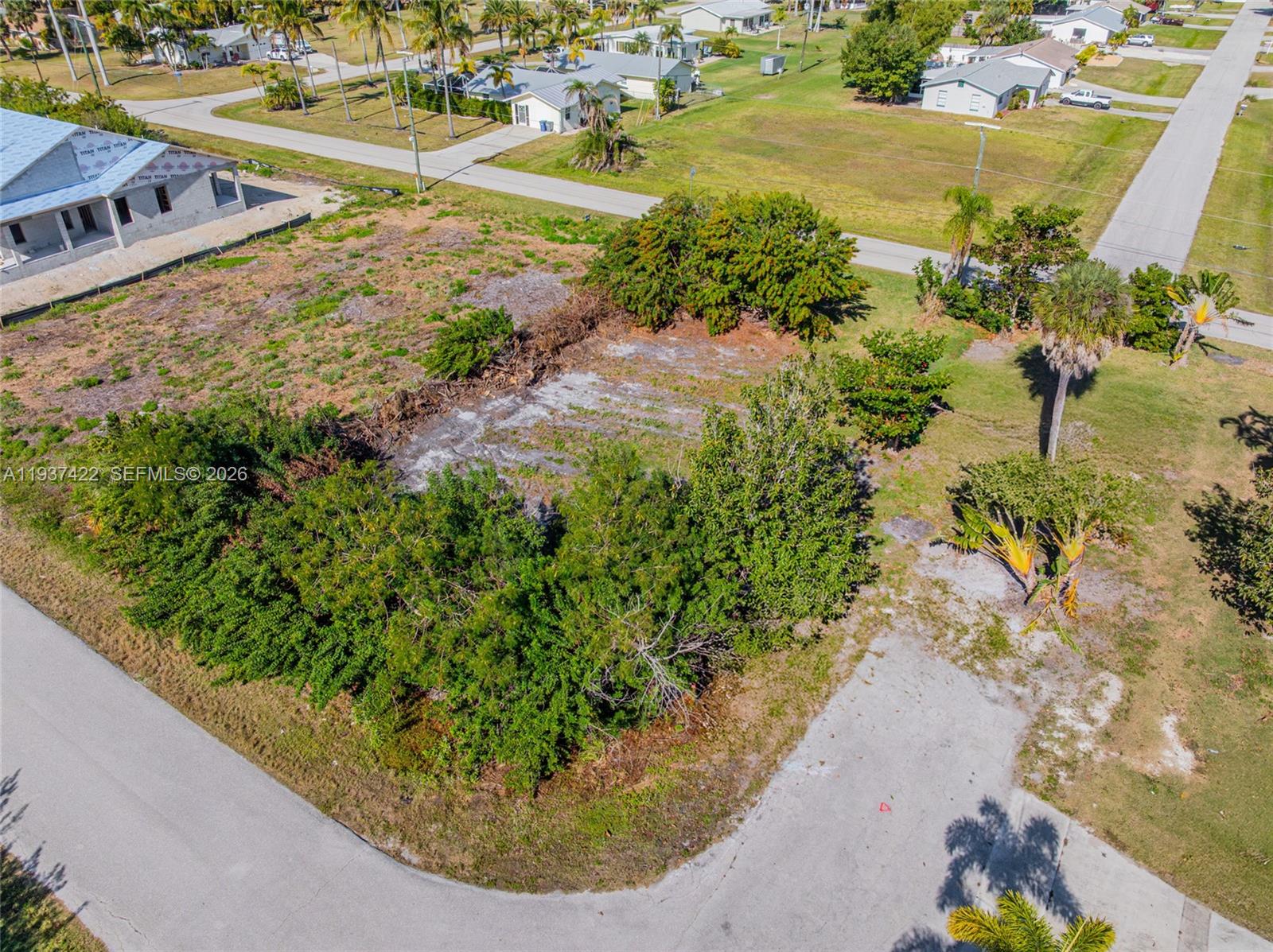 7324 Cobb Road Bokeelia, FL 33922 - Photo 12 of 24 a view of a pathway with a yard