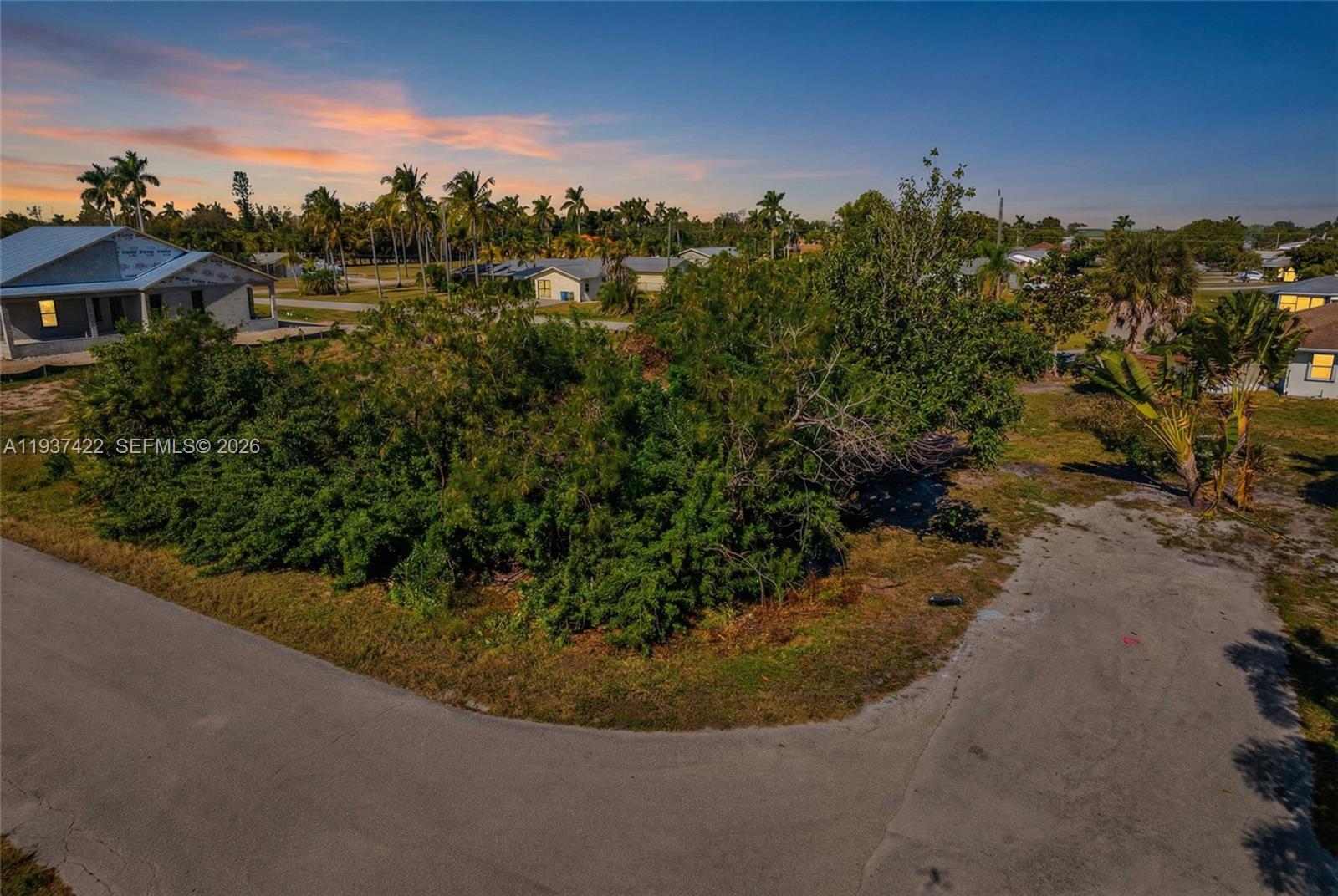 7324 Cobb Road Bokeelia, FL 33922 - Photo 16 of 24 a view of a lake with a house