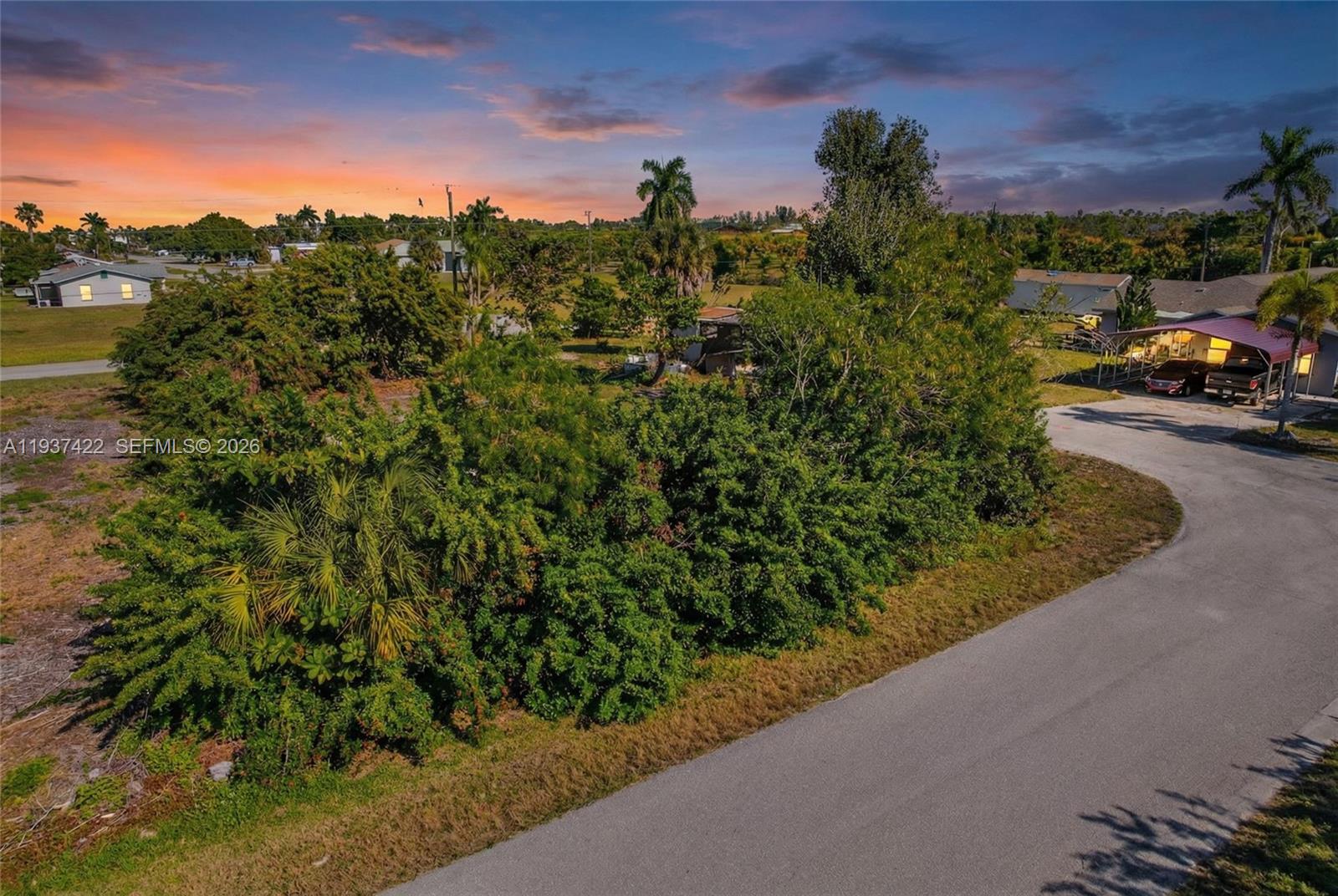 7324 Cobb Road Bokeelia, FL 33922 - Photo 17 of 24 a view of a city street from a building