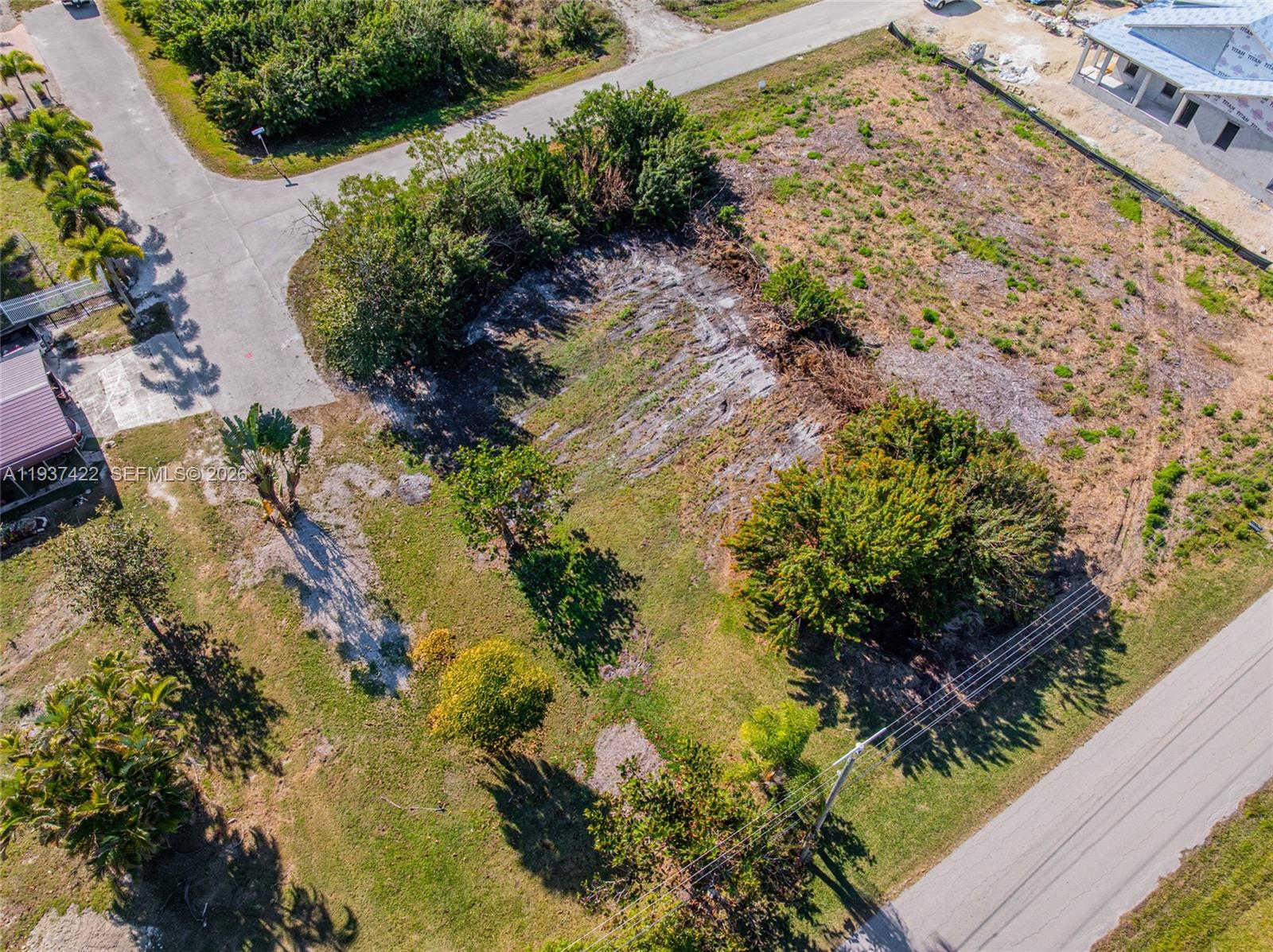 7324 Cobb Road Bokeelia, FL 33922 - Photo 2 of 24 a view of a garden with plants
