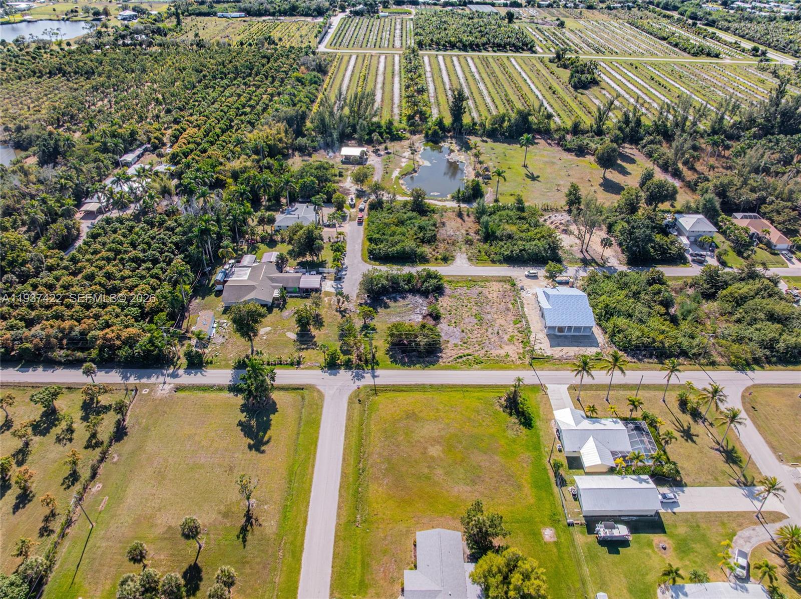 7324 Cobb Road Bokeelia, FL 33922 - Photo 21 of 24 an aerial view of residential houses with outdoor space