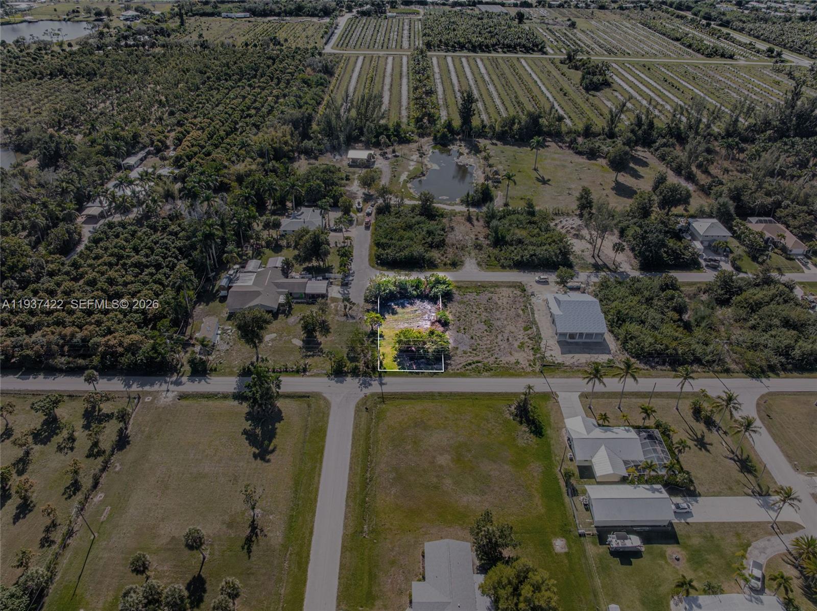 7324 Cobb Road Bokeelia, FL 33922 - Photo 24 of 24 an aerial view of houses with outdoor space