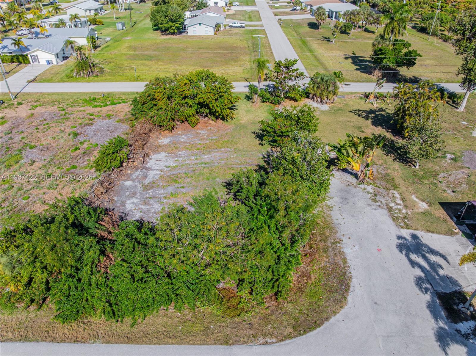 7324 Cobb Road Bokeelia, FL 33922 - Photo 5 of 24 a view of a yard with an outdoor space