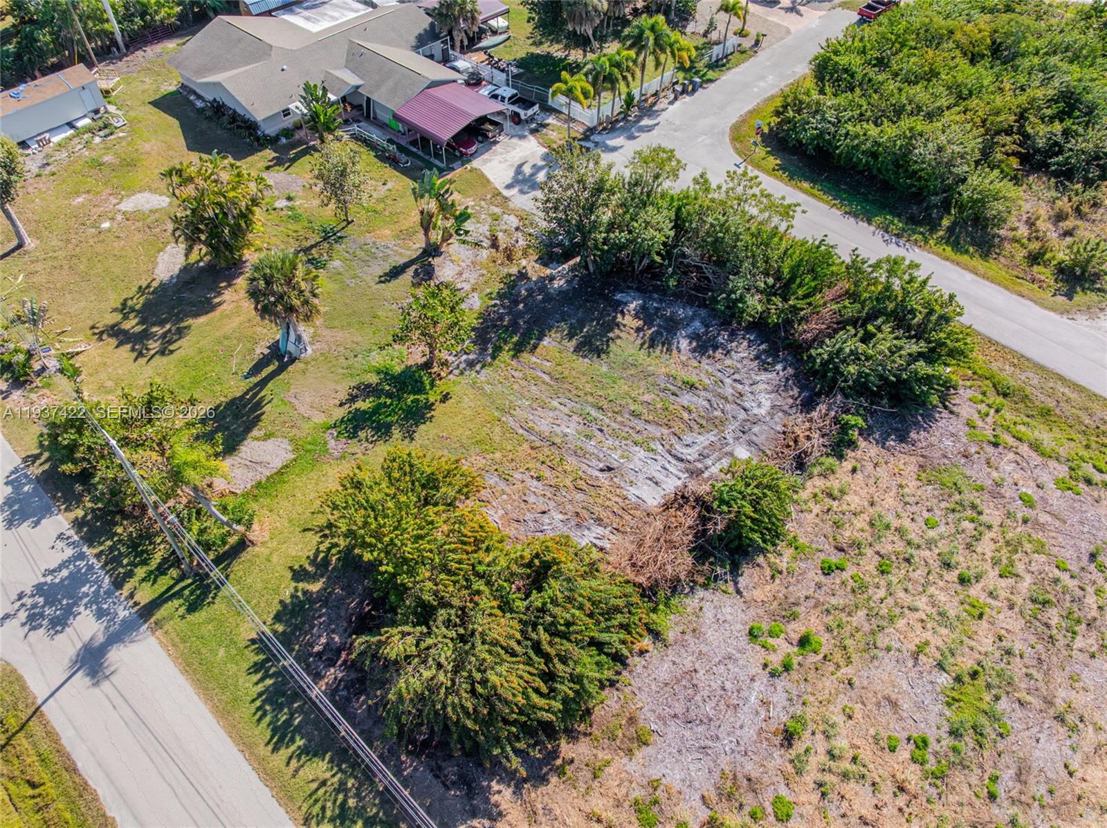 7324 Cobb Road Bokeelia, FL 33922 - Photo 10 of 24 a view of a garden with plants