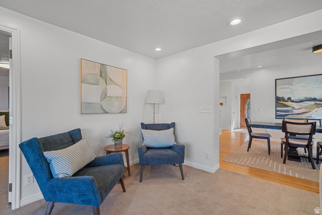4426 South 3035 East Holladay, UT 84124 - Photo 15 of 49 Sitting room with carpet floors, recessed lighting, and a textured ceiling