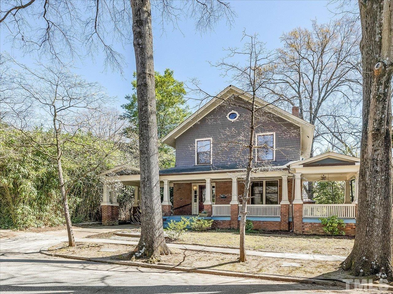 118 Hawthorne Road Raleigh, NC 27605 - Photo 1 of 42 a front view of a house with street