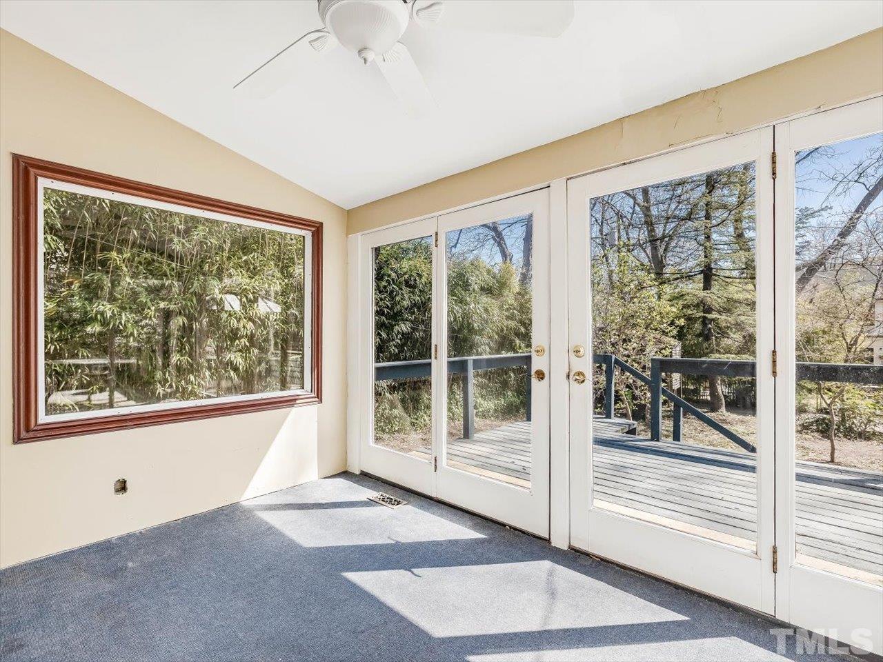 118 Hawthorne Road Raleigh, NC 27605 - Photo 19 of 42 a view of empty room with wooden floor and fan