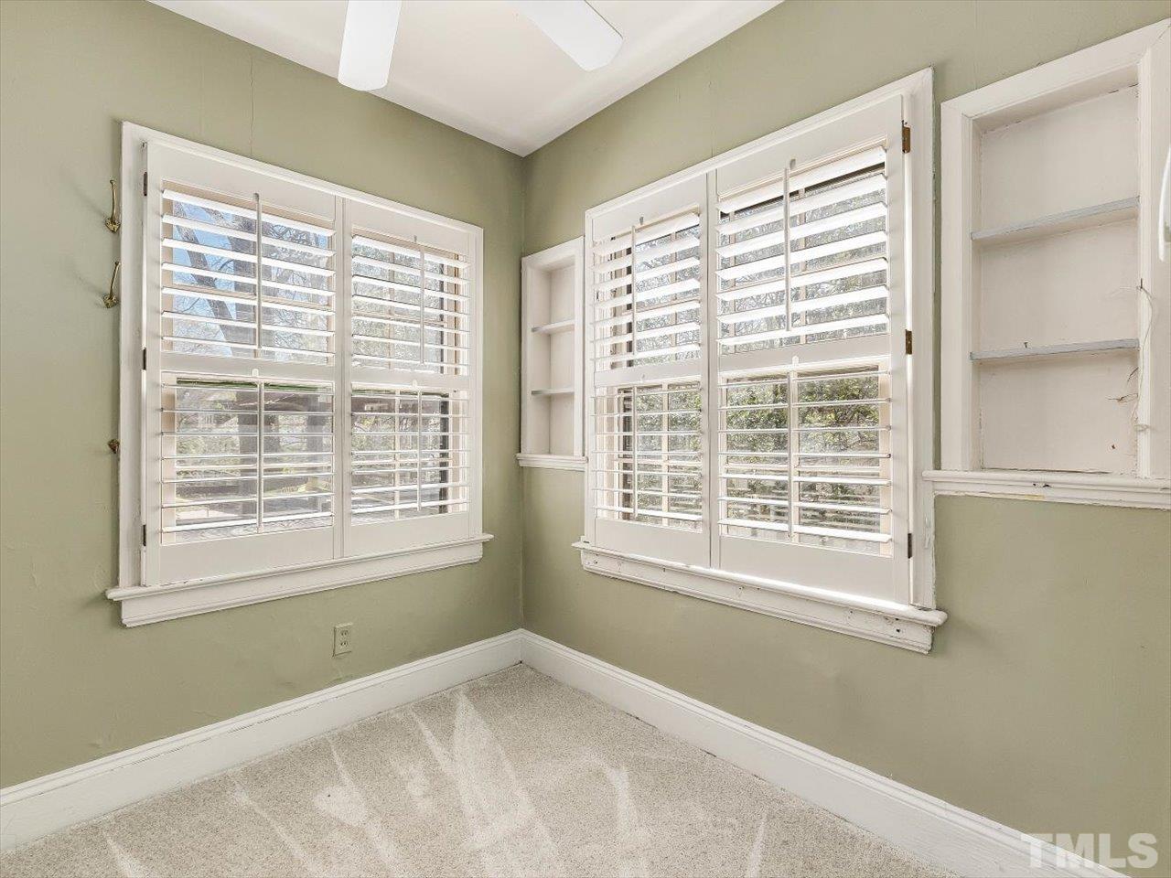 118 Hawthorne Road Raleigh, NC 27605 - Photo 24 of 42 a view of an empty room with a window