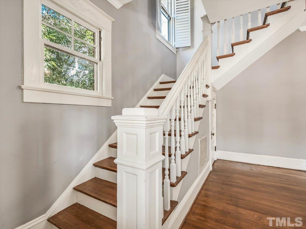 118 Hawthorne Road Raleigh, NC 27605 - Photo 25 of 42 a view of entryway and hall with wooden floor