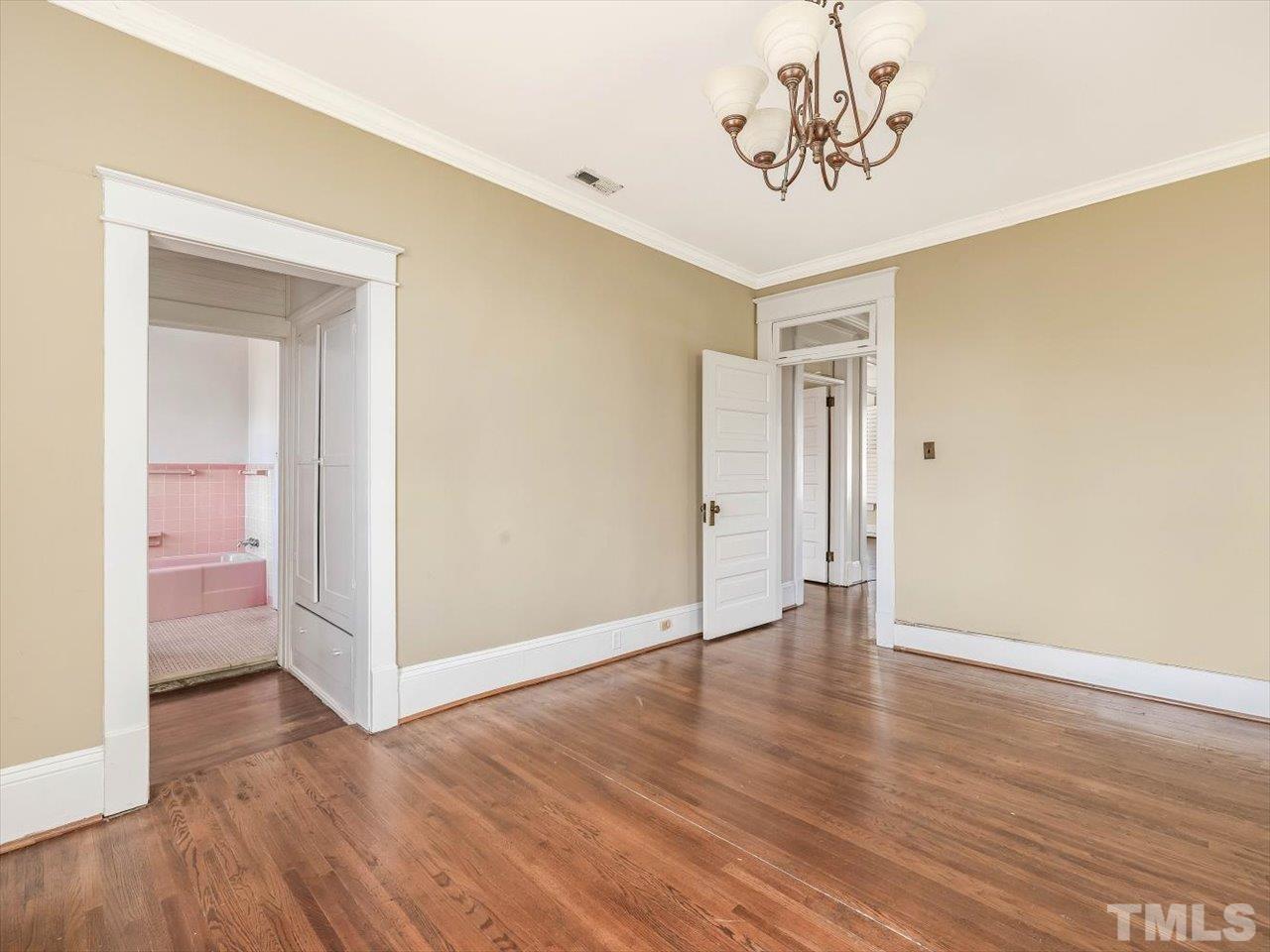 118 Hawthorne Road Raleigh, NC 27605 - Photo 31 of 42 a view of a room with wooden floor and window