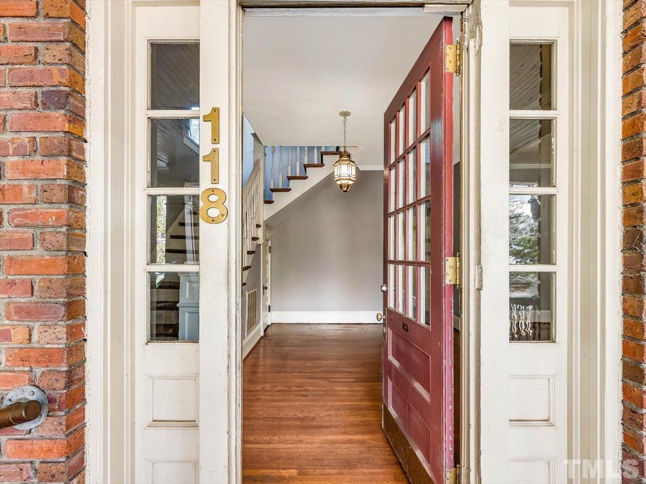 118 Hawthorne Road Raleigh, NC 27605 - Photo 5 of 42 a view of entryway and hall with wooden floor