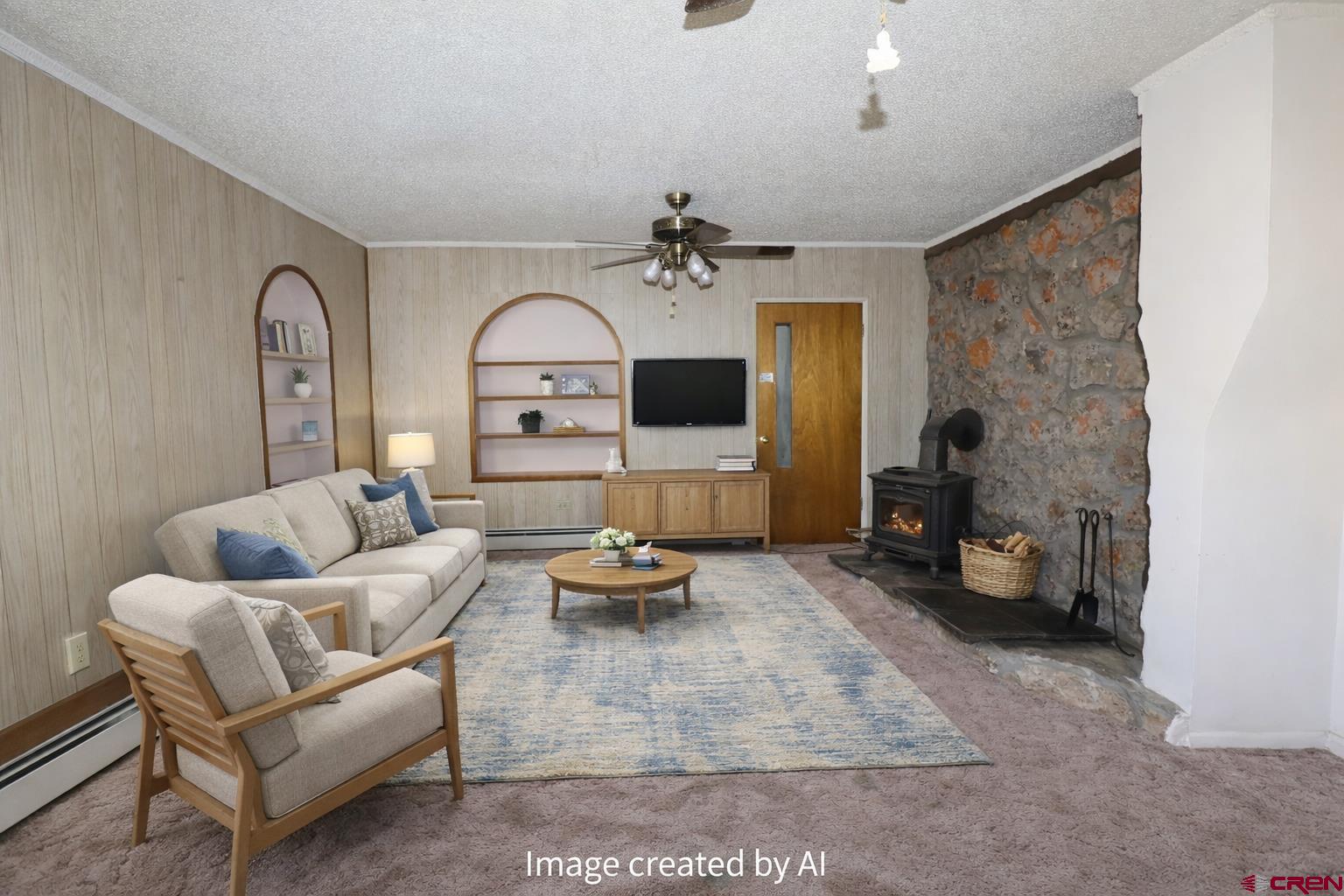 730 8th Street Alamosa, CO 81101 - Photo 17 of 29 a living room with furniture and a chandelier