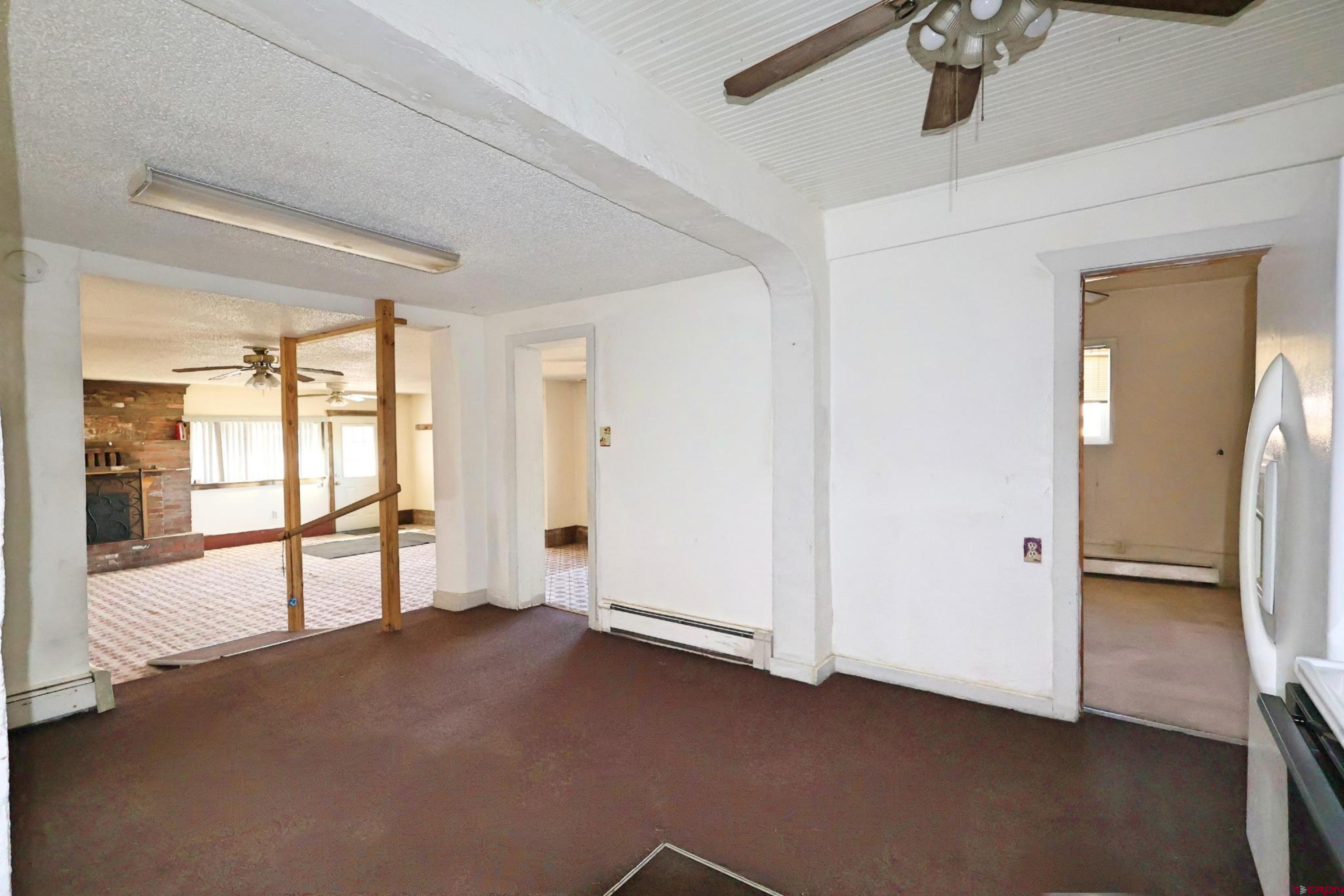 730 8th Street Alamosa, CO 81101 - Photo 21 of 29 a view of an empty room and window