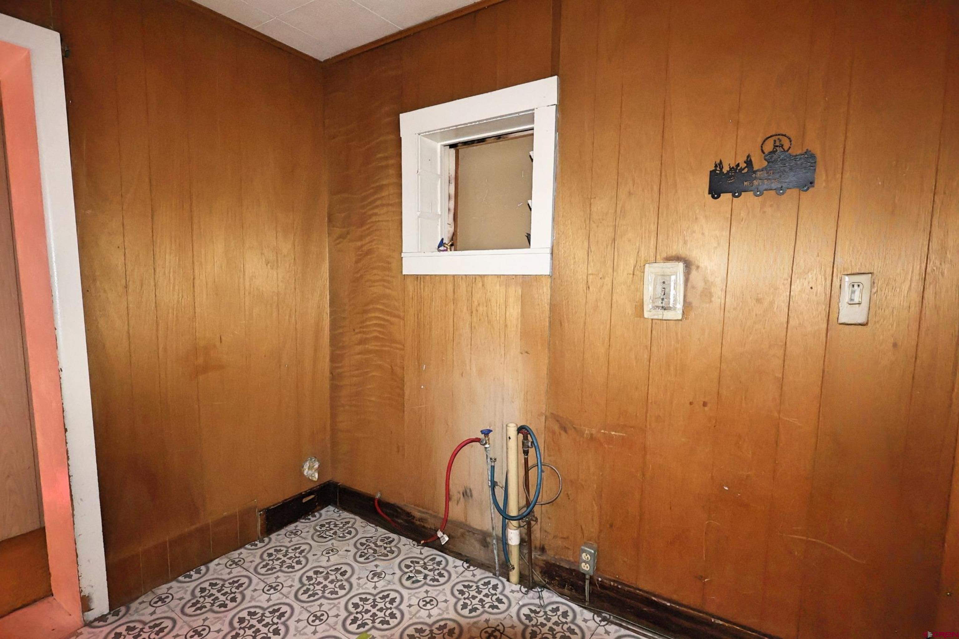 730 8th Street Alamosa, CO 81101 - Photo 9 of 29 a view of small space with wooden door