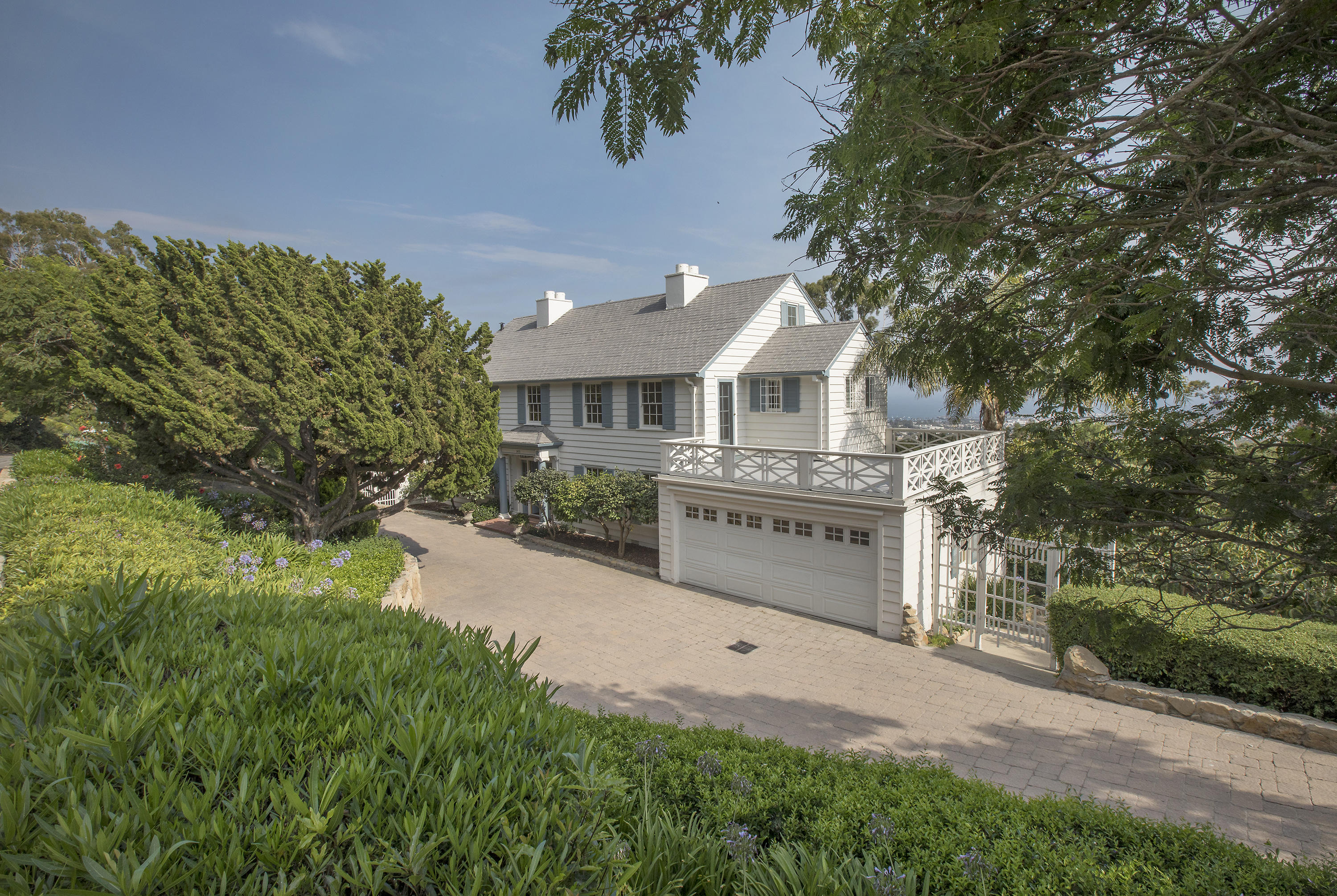 1415 Dover Road Santa Barbara, CA 93103 - Photo 1 of 40 a view of residential houses with yard and green space