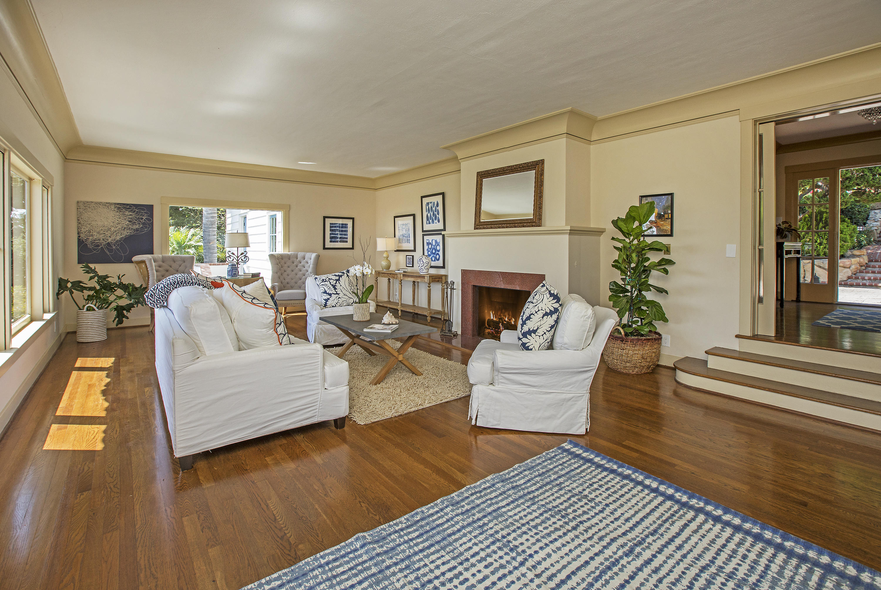 1415 Dover Road Santa Barbara, CA 93103 - Photo 16 of 40 a living room with furniture and a fireplace