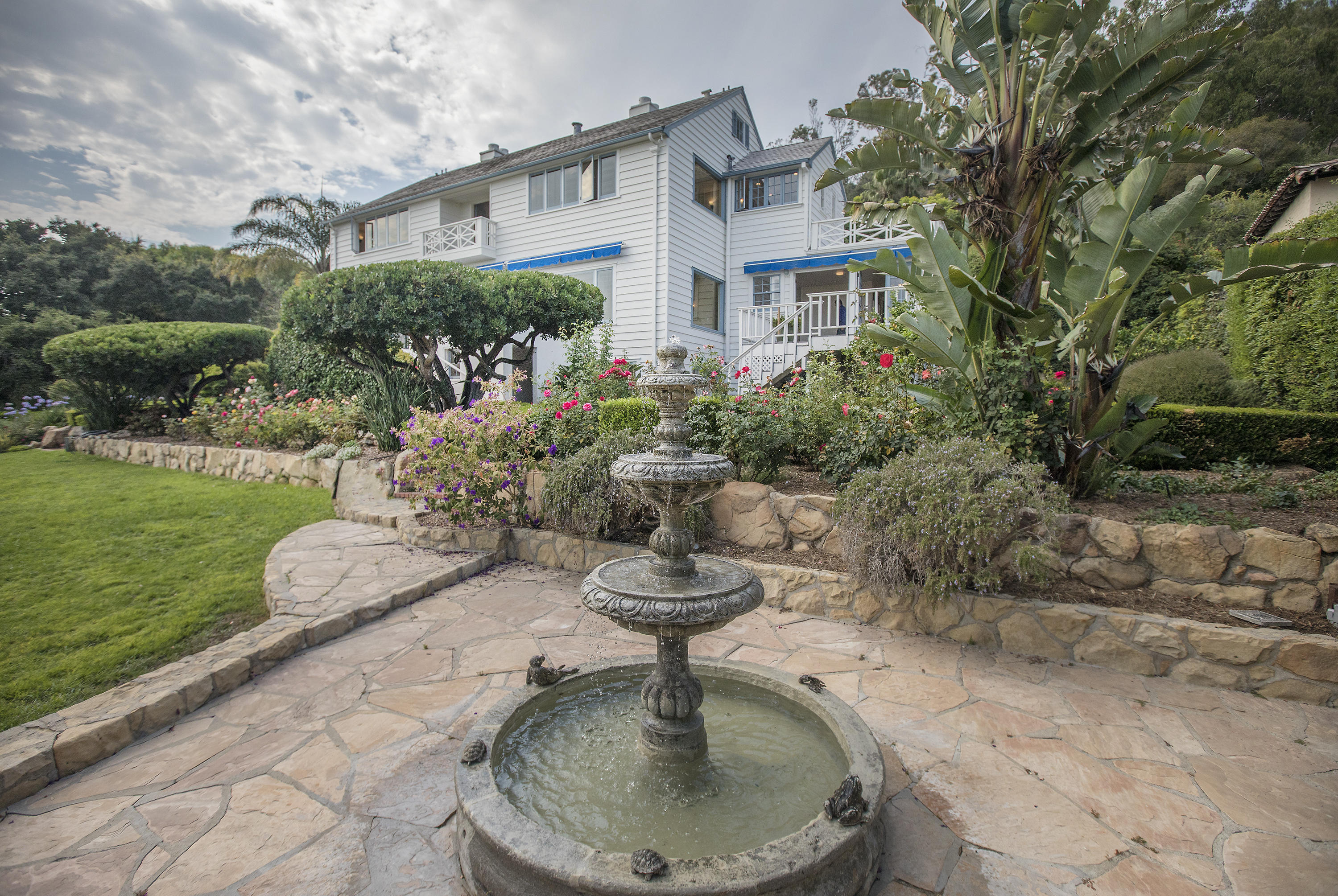 1415 Dover Road Santa Barbara, CA 93103 - Photo 2 of 40 a swimming pool with barbeque oven and outdoor seating