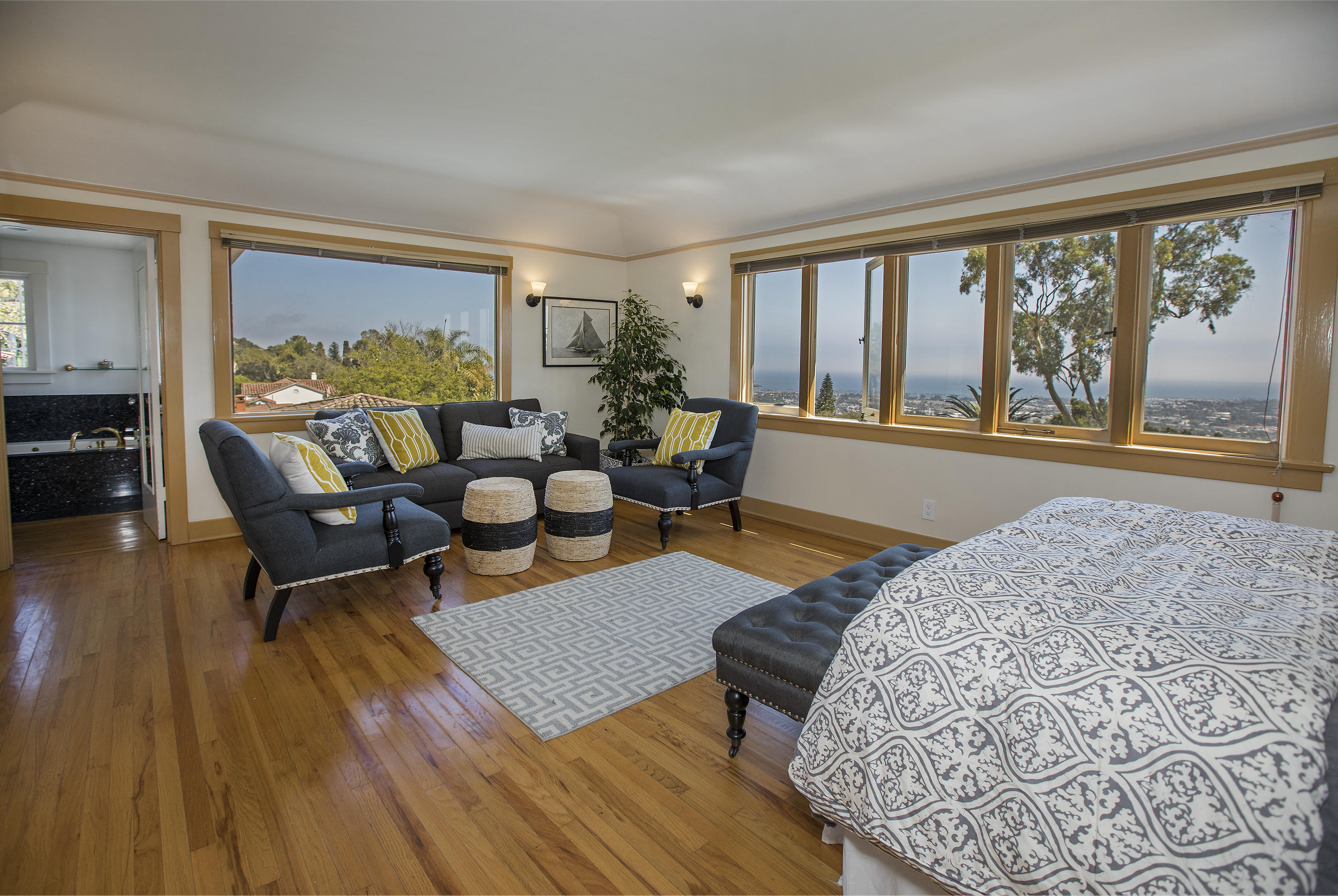 1415 Dover Road Santa Barbara, CA 93103 - Photo 21 of 40 a living room with furniture and a large window