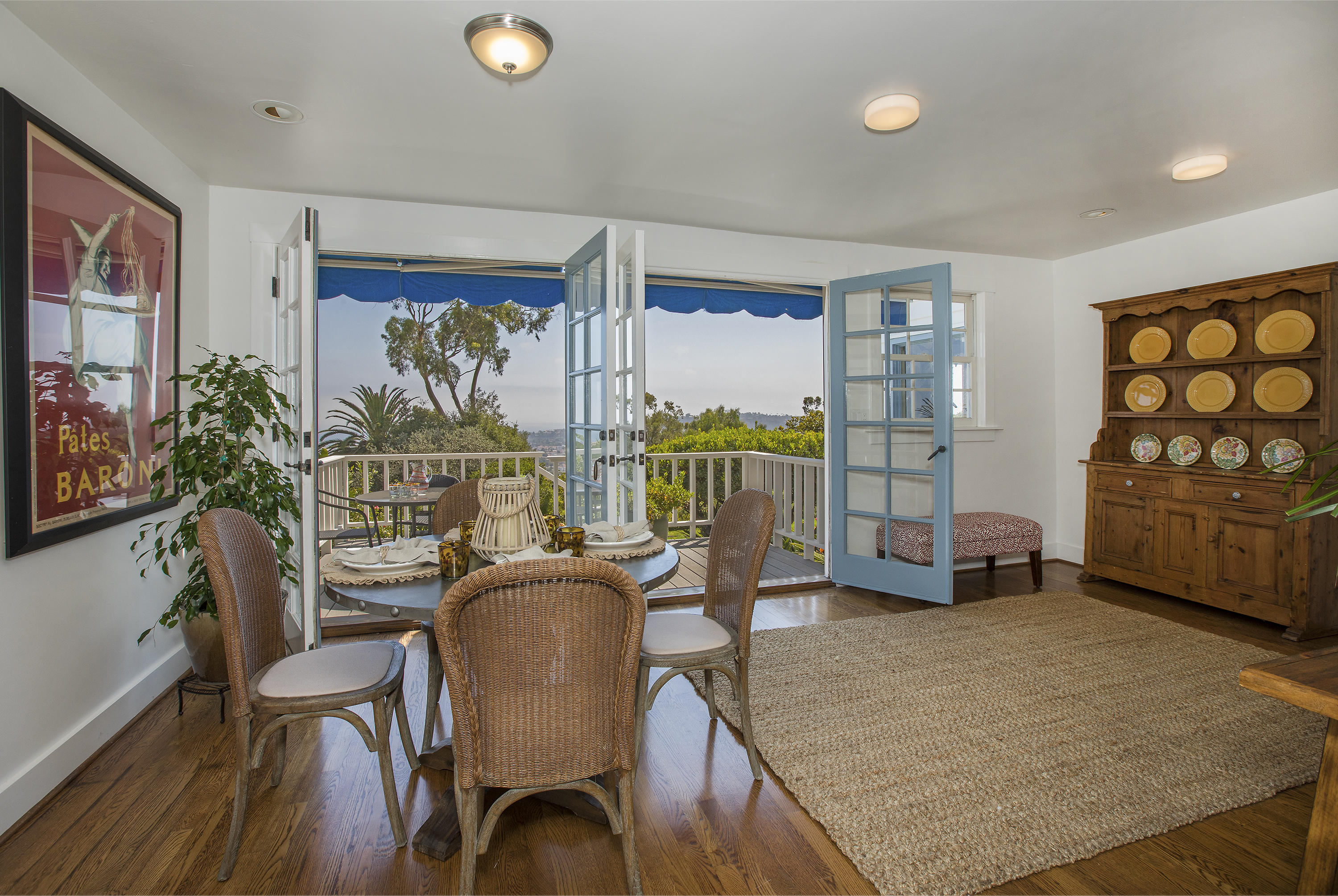 1415 Dover Road Santa Barbara, CA 93103 - Photo 10 of 40 a dining room with furniture and a floor to ceiling window