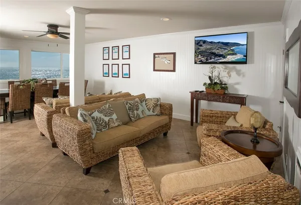 a living room with furniture and a rug