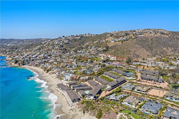 an aerial view of residential building with parking space